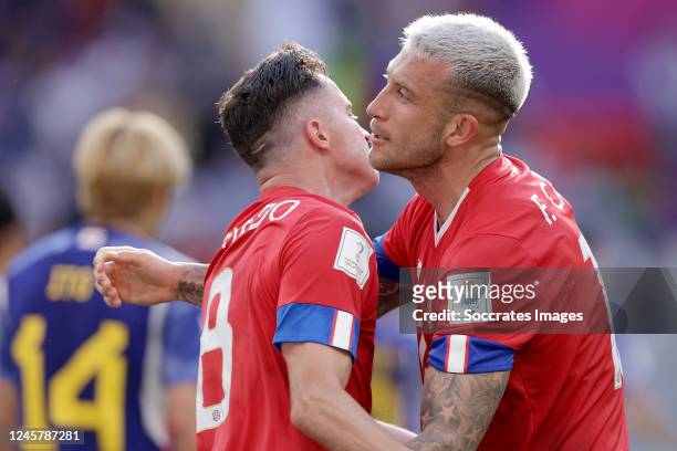 Bryan Oviedo of Costa Rica, Francisco Calvo of Costa Rica celebrating the victroy during the World Cup match between Japan v Costa Rica at the Ahmad...