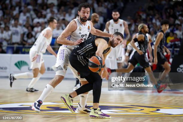 José Manuel Calderón, former player, poses for a selfie with a fan prior the 2022-23 Turkish Airlines EuroLeague Regular Season Round 15 game between...