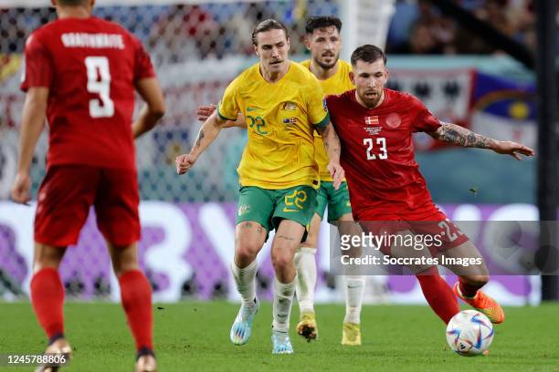 Jackson Irvine of Australia, Pierre Emile Hojbjerg of Denmark during the World Cup match between Australia v Denmark at the Al Janoub Stadium on...