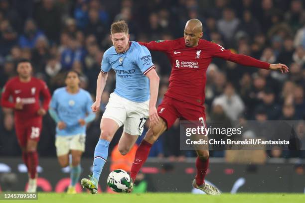 Fabinho of Liverpool competes with Kevin de Bruyne of Manchester City during the Carabao Cup Fourth Round match between Manchester City and Liverpool...