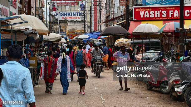 Busy street in Madurai, Tamil Nadu, India, on May 18, 2022.