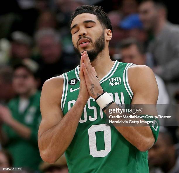 December 21: Jayson Tatum of the Boston Celtics says a prayer before the start of the first quarter of the NBA game against the Indiana Pacers at the...