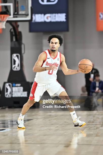 Jacob Gilyard of the Memphis Hustle dribbles the ball during the game against the Motor City Cruise during the 2022-23 G League Winter Showcase on...