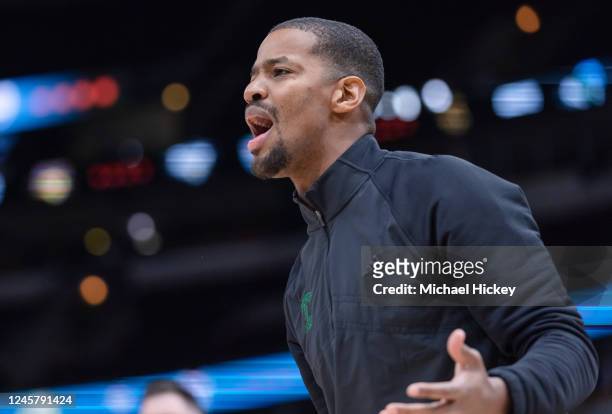 Head coach Kim English of the George Mason Patriots is seen during the game against the Tulane Green Wave during the Legends of Basketball Showcase...