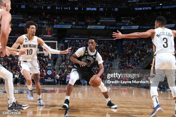 Stanley Johnson of the San Antonio Spurs handles the ball during the game against the New Orleans Pelicans on December 22, 2022 at the Smoothie King...