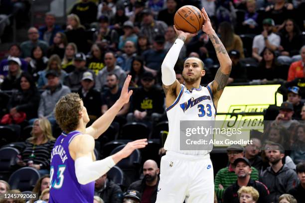 Kyle Kuzma of the Washington Wizards shoots over Lauri Markkanen of the Utah Jazz during the first half of a game at Vivint Arena on December 22,...