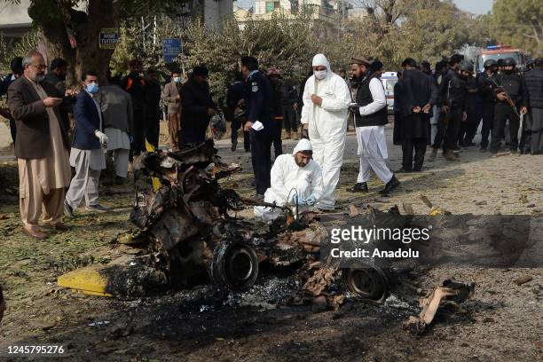 Security forces on the scene after at least one policeman was killed and four others injured in a suicide blast in Pakistan's capital Islamabad on...