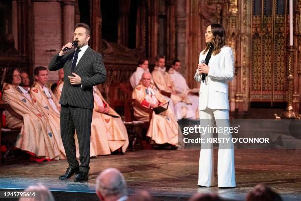 Singers Alfie Boe and Melanie C perform during the 'Royal Carols: Together At Christmas', at Westminster Abbey in London on December 15, 2022. - The...