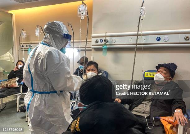 People receive medical attention in a Fever Clinic area in a Hospital in the Changning district in Shanghai, on December 23, 2022 - China is battling...