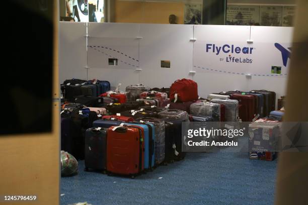 Bags and luggage are seen at Vancouver International Airport's domestic arrivals on December 22, 2022 in Vancouver, BC, Canada. 115 flights out of...