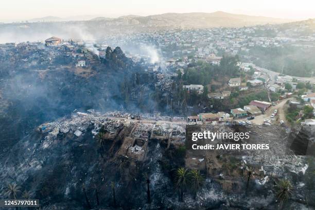 Aerial view of houses destroyed by a forest fire that affected the hills of Vina del Mar, in the Valparaiso region, Chile, taken on December 23,...