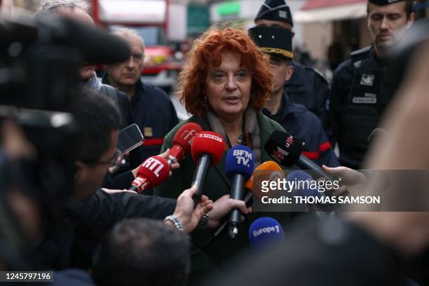Paris prosecutor Laure Beccuau speaks to the press after several shots were fired along rue d'Enghien in the 10th arrondissement, in Paris on...