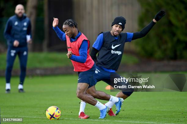 Raheem Sterling and Pierre-Emerick Aubameyang of Chelsea during a training session at Chelsea Training Ground on December 23, 2022 in Cobham, England.