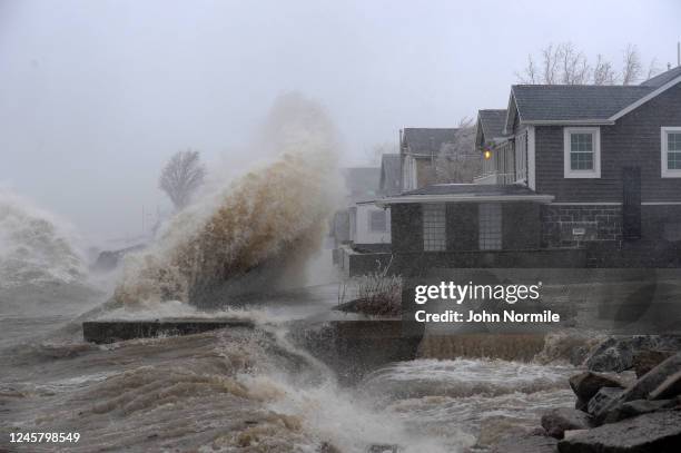 Lake Erie waters wash over the shoreline on December 23, 2022 in Hamburg, New York. The Buffalo suburb and surrounding area are expecting wind gusts...