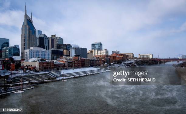 Steam rises off of the Cumberland River in Nashville, Tennessee, on December 23, 2022 after winter storm Elliot moved through the Middle Tennessee...