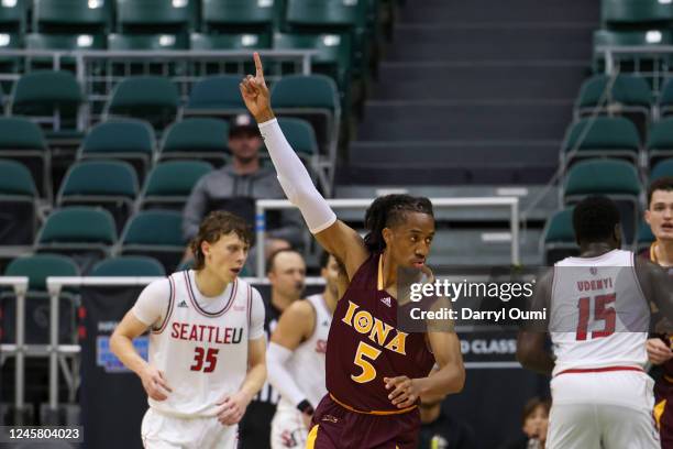 Daniss Jenkins of the Iona Gaels gestures to the crowd after making a basket during the second half of the Hawaiian Airlines Diamond Head Classic...