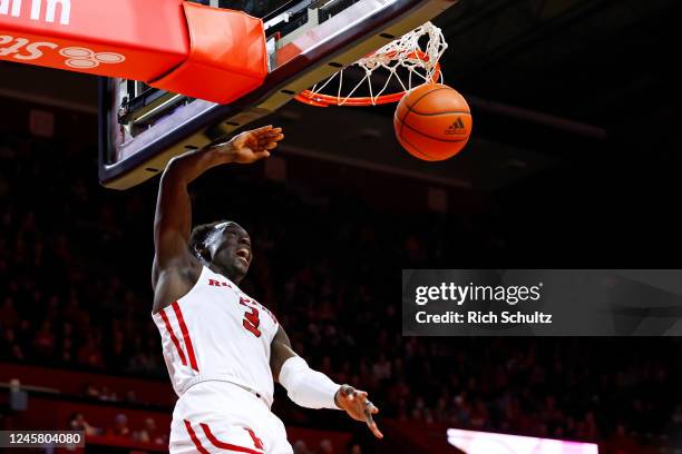 Mawot Mag of the Rutgers Scarlet Knights reacts after a dunk against the Bucknell Bison during the second half of a game at Jersey Mike's Arena on...