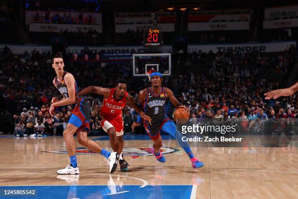 Shai Gilgeous-Alexander of the Oklahoma City Thunder drives to the basket during the game against the New Orleans Pelicans on December 23, 2022 at...