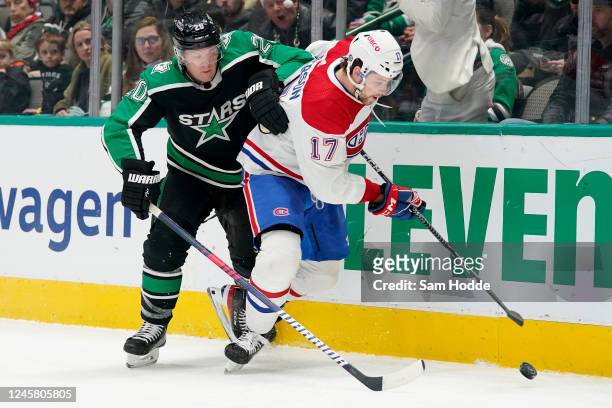 Josh Anderson of the Montreal Canadiens and Ryan Suter of the Dallas Stars battle for the puck during the second period at American Airlines Center...