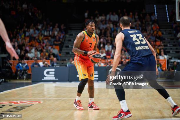 Chris Jones of Valencia basket and Nikola Mirotic of FC Barcelona in action during the J15 Turkish Airlines Euroleague at Fuente de San Luis Sport...