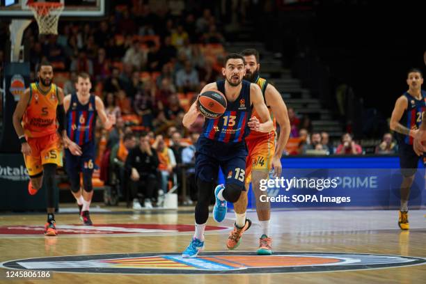 Tomas Satoransky of FC Barcelona and Bojan Dubljevic of Valencia basket in action during the J15 Turkish Airlines Euroleague at Fuente de San Luis...