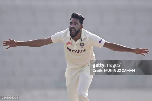 Indias Mohammed Siraj appeals unsuccessfully against Bangladesh's Zakir Hasan during the third day of the second cricket Test match between...