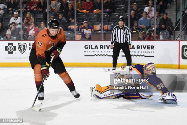 Nick Bjugstad of the Arizona Coyotes gets ready to take a shot against Jonathan Quick of the Los Angeles Kings during the shootout at Mullett Arena...