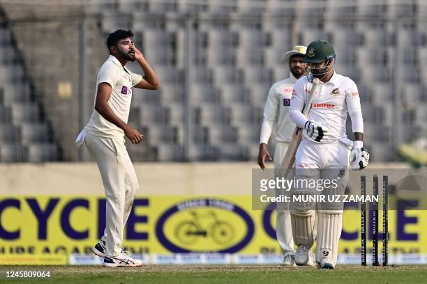 Indias Mohammed Siraj reacts after the dismissal of Bangladesh Litton Das during the third day of the second cricket Test match between Bangladesh...