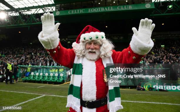 Santa Claus makes an appearance at half time during a cinch Premiership match between Celtic and St Johnstone at Celtic Park, on December 24 in...