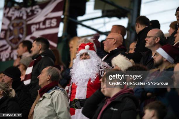 Hearts fan dresses as Santa during a cinch Premiership match between Dundee United and Hearts at Tannadice, on December 24 in Dundee, Scotland.