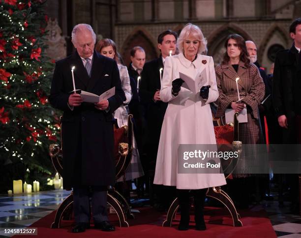 In this photo released on December 24, King Charles III and Camilla, Queen Consort are seen during the 'Together at Christmas' Carol Service at...