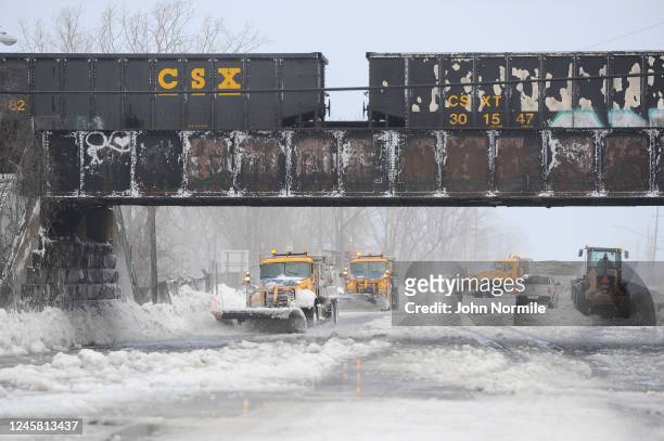 Plows work to clear ice and snow along the Lake Erie shoreline on December 24, 2022 in Hamburg, New York. The Buffalo suburb and surrounding area...