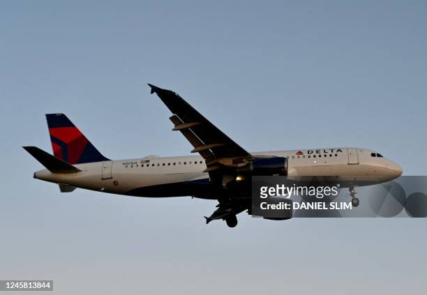Delta airlines Airbus 320 approaches Ronald Reagan Washington National Airport in Arlington, Virginia, on December 24, 2022.