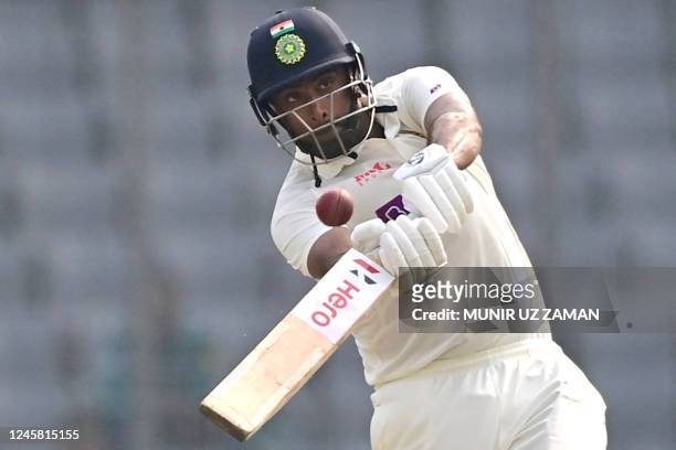 India's Ravichandran Ashwin plays a shot during the fourth day of the second cricket Test match between Bangladesh and India at the Sher-e-Bangla...