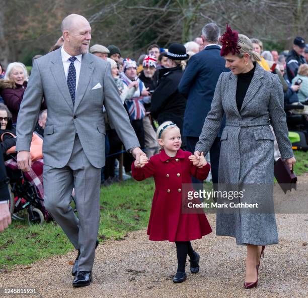Zara Tindall and Mike Tindall with Lena Tindall attend the Christmas Day service at St Mary Magdalene Church on December 25, 2022 in Sandringham,...