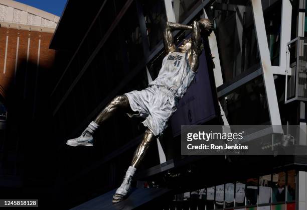 View of the statue of Dallas Mavericks legend Dirk Nowitzki by artist Omri Amrany after being unveiled at American Airlines Center on December 25,...