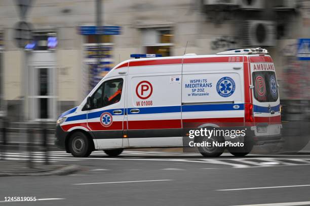 An ambulance is seen speeding round a corner in Warsaw, Poland on 25 December, 2022.