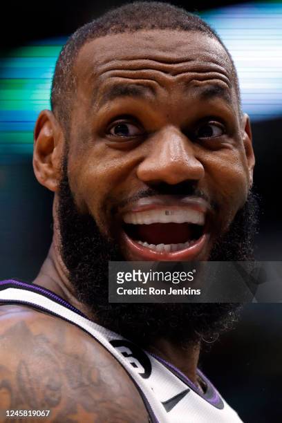 LeBron James of the Los Angeles Lakers reacts as the Lakers play the Dallas Mavericks in the second half at American Airlines Center on December 25,...