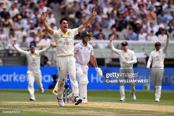 Australia's Pat Cummins appeals for a caught behind decision against South African batsman Sarel Erwee on the first day of the second cricket Test...