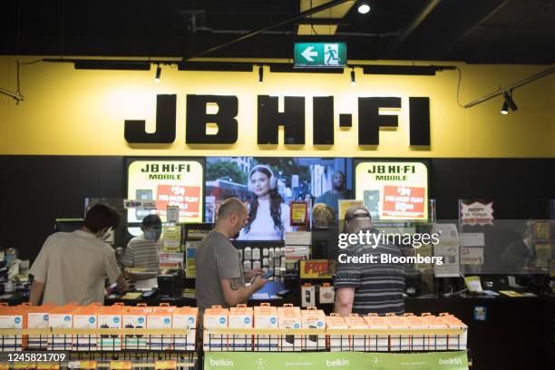 Customers pay for items at a JB Hi-Fi Ltd. Store in Sydney, Australia, on Monday, Dec. 26, 2022. Australias consumer sentiment remained deeply...