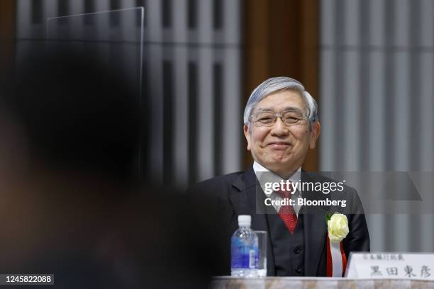 Haruhiko Kuroda, governor of the Bank of Japan , reacts during a council meeting at business lobby Keidanren in Tokyo, Japan, on Monday, Dec. 26,...