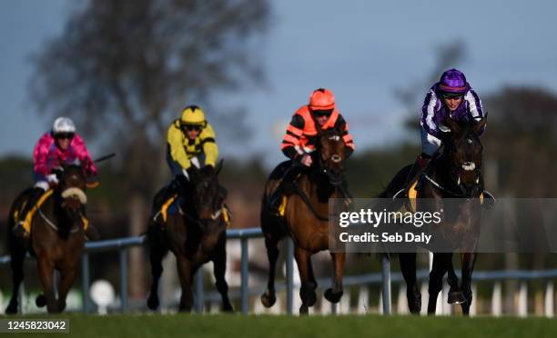 Dublin , Ireland - 26 December 2022; High Definition, right, with JJ Slevin up, on their way to winning the All About Sunday Maiden Hurdle on day one...