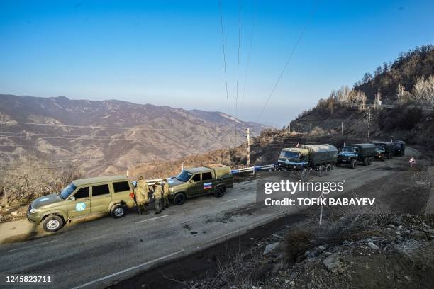 Russian peacekeepers are seen deployed at the Lachin corridor, the Armenian-populated breakaway Nagorno-Karabakh region's only land link with...