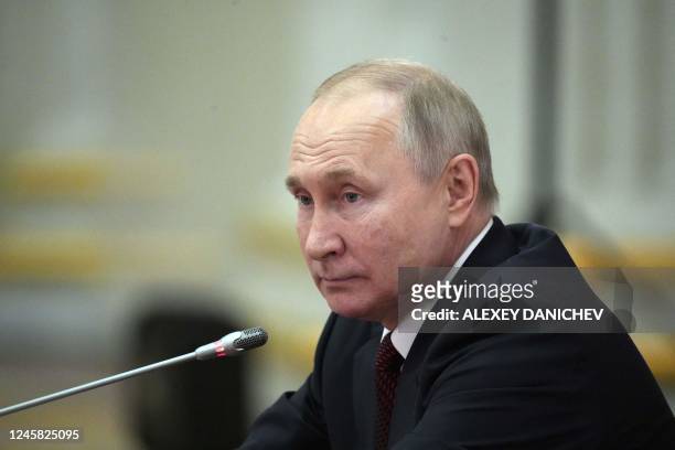 Russian President Vladimir Putin attends an informal meeting of the heads of state of the Commonwealth of Independent States at the Boris Yeltsin...