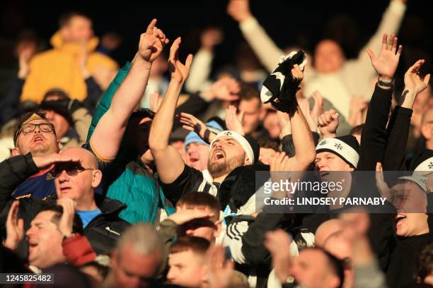 Newcastle fans build the atmosphere ahead of the English Premier League football match between Leicester City and Newcastle United at King Power...