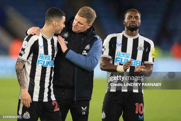 Newcastle United's Paraguayan midfielder Miguel Almiron , Newcastle United's English head coach Eddie Howe and Newcastle United's French midfielder...