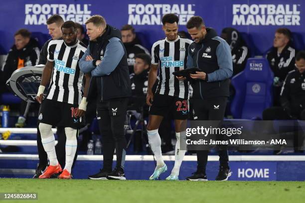 Allan Saint-Maximin and Eddie Howe the manager / head coach of Newcastle United and Jacob Murphy of Newcastle United and Newcastle United assistant...