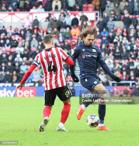 Blackburn Rovers' Bradley Dack tackles Sunderland's Corry Evans during the Sky Bet Championship between Sunderland and Blackburn Rovers at Stadium of...