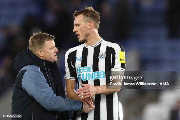 Eddie Howe the manager / head coach of Newcastle United and Dan Burn of Newcastle United at full time of the Premier League match between Leicester...