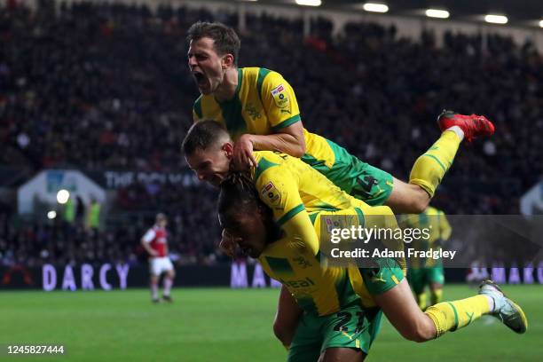 Brandon Thomas-Asante of West Bromwich Albion celebrates after scoring a goal to make it 0-2 with Conor Townsend of West Bromwich Albion and Jayson...